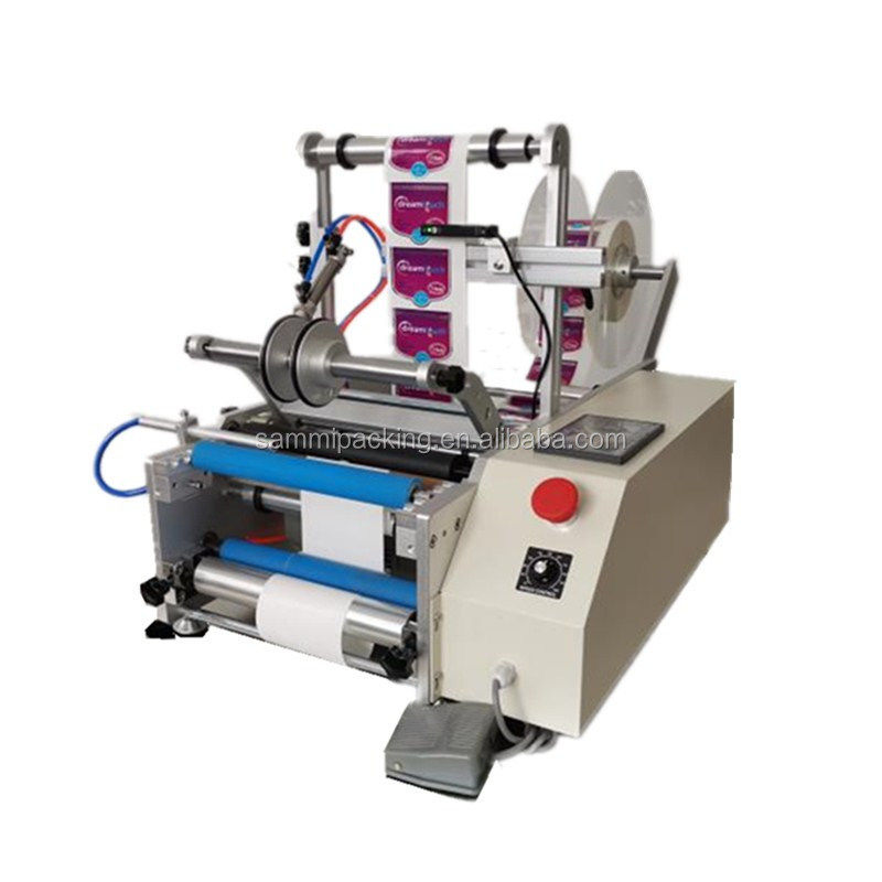 Ημιαυτόματη μηχανή ετικετοποίησης στρογγυλών φιαλών γυαλιού 10ml με αυτοκόλλητες ετικέτες μονής/διπλής όψης